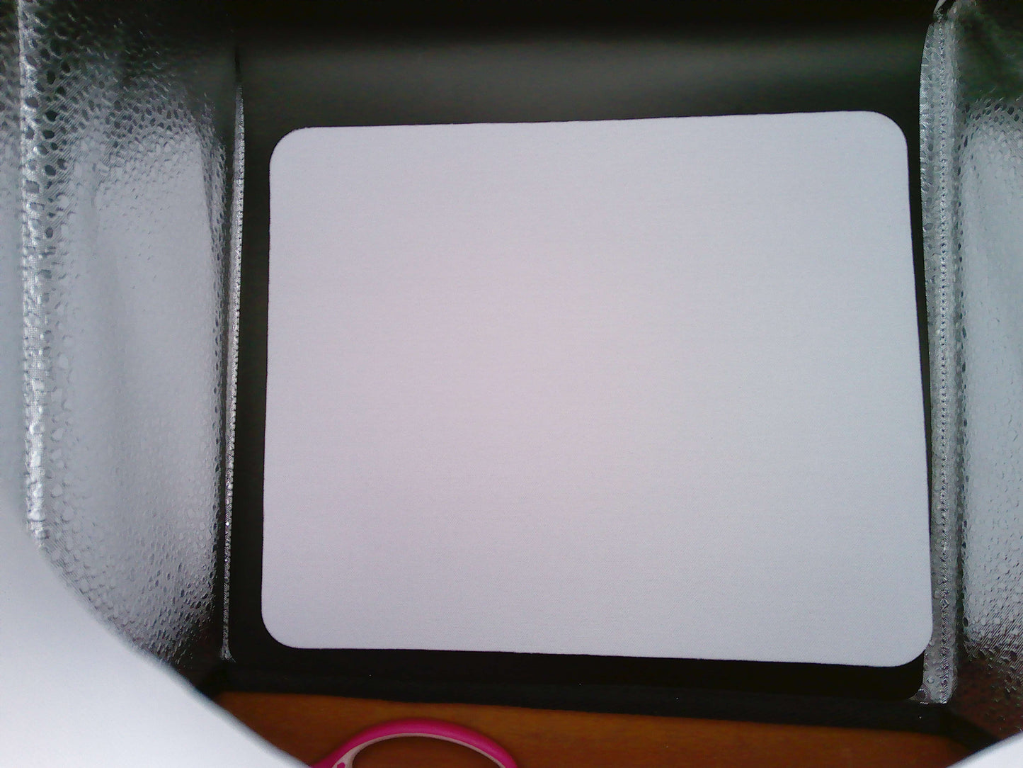 Sublimation-friendly blank mouse pad showcasing smooth surface for custom designs and vibrant colors.